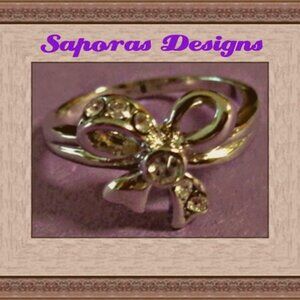 Silver Tone Bow Design Ring Size 5.5 With Clear Crystals